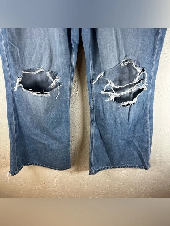 American Eagle Dreamy Drape Low Rise Flare Leg Jeans in Blue - Picture 7 of 14